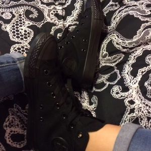 All black high top converse